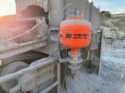 Eliminating Conveyor Chute Blockages in a Gold Mining Operation